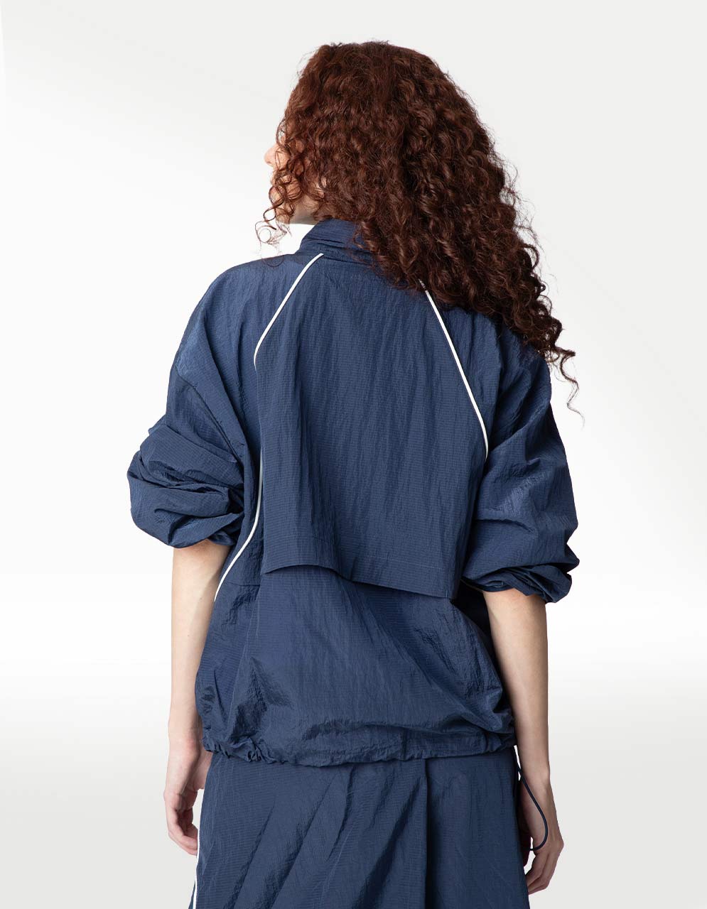 Chamarra New Balance Sport Legacy Azul - Mujer — imagen 5
